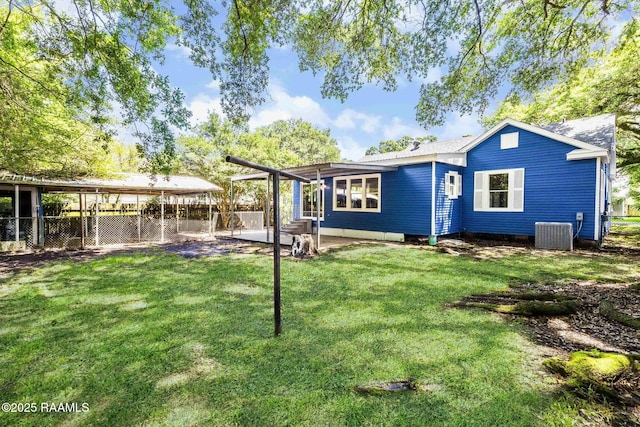 809 Saint Thomas St, Lafayette, LA 70506 - back of house with central AC and a patio area