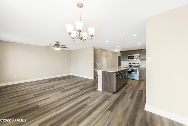 119 Sandstone Ave, Scott, LA 70583 - kitchen with appliances with stainless steel finishes, a chandelier, dark brown cabinetry, baseboards, and recessed lighting