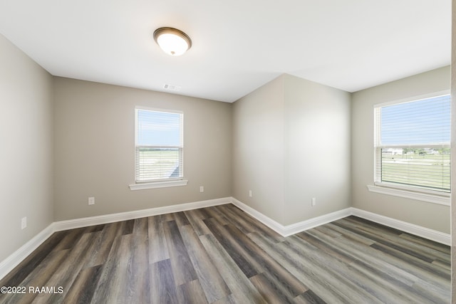 119 Sandstone Ave, Scott, LA 70583 - empty room featuring dark wood finished floors and baseboards