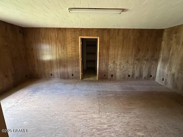 18711 La Highway 35, Abbeville, LA 70510 - spare room with wooden walls