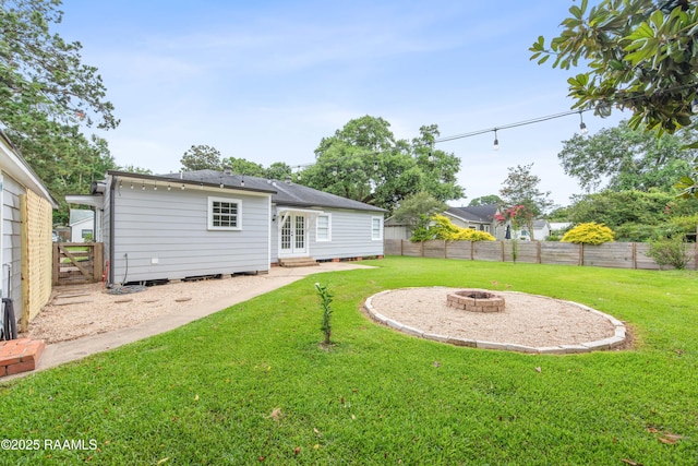 110 Memory Ln, Lafayette, LA 70506 - back of house with entry steps and an outdoor fire pit