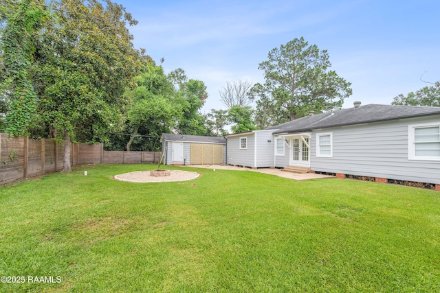 110 Memory Ln, Lafayette, LA 70506 - view of yard featuring french doors, entry steps, an outdoor fire pit, and a patio