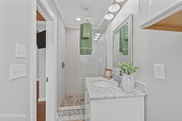 110 Memory Ln, Lafayette, LA 70506 - full bath with vanity, a tile shower, and crown molding