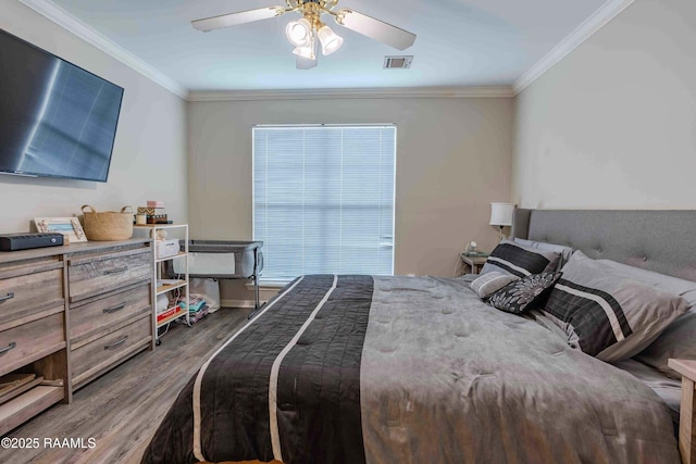 114 Cane Ridge Cir, Lafayette, LA 70508 - bedroom featuring wood finished floors, crown molding, and ceiling fan