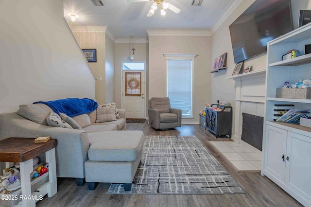 114 Cane Ridge Cir, Lafayette, LA 70508 - living area featuring wood finished floors, ceiling fan, and ornamental molding