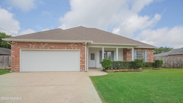 2116 George Dr, Opelousas, LA 70570 - view of front of property with driveway, brick siding, roof with shingles, and a garage