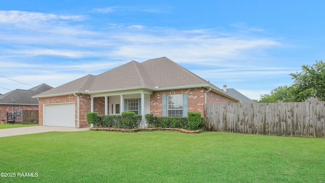 2116 George Dr, Opelousas, LA 70570 - traditional-style home with brick siding, driveway, an attached garage, and roof with shingles