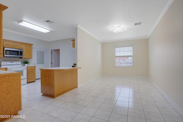 2116 George Dr, Opelousas, LA 70570 - kitchen with stainless steel microwave, electric range, light countertops, ornamental molding, and baseboards