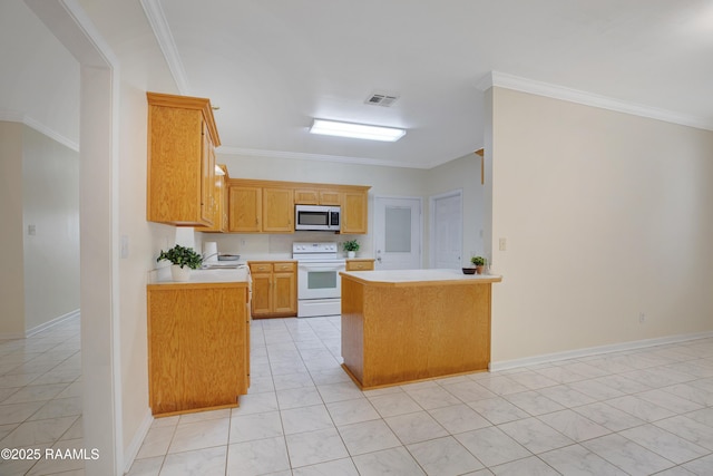 2116 George Dr, Opelousas, LA 70570 - kitchen featuring white range with electric stovetop, stainless steel microwave, light countertops, ornamental molding, and a peninsula