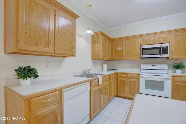 2116 George Dr, Opelousas, LA 70570 - kitchen with white appliances, a sink, ornamental molding, light countertops, and pendant lighting
