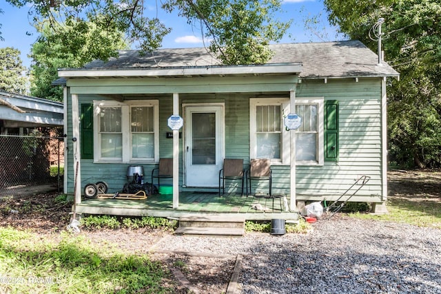 1110 Louisiana Ave, Lafayette, LA 70501 - view of front of house featuring a porch and roof with shingles