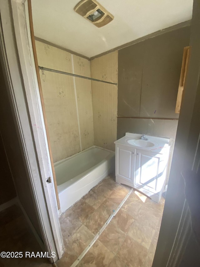 913 Plum St, Lafayette, LA 70501 - bathroom with a tub and vanity
