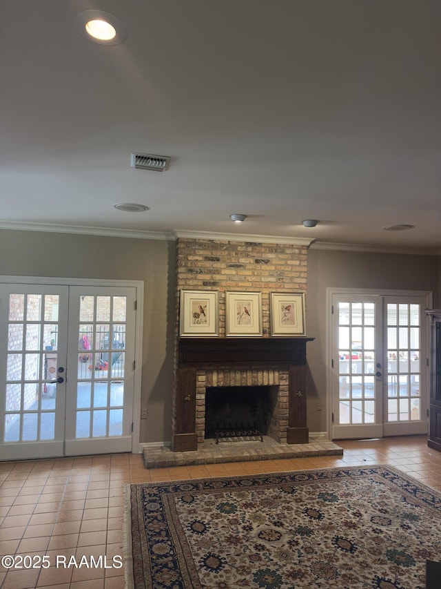 404 Old Settlement Rd, Lafayette, LA 70508 - unfurnished living room featuring french doors, tile patterned floors, a fireplace, ornamental molding, and baseboards