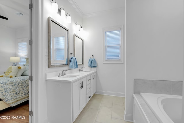 337 Bozeman Trl, Scott, LA 70583 - full bathroom with double vanity, connected bathroom, ornamental molding, a garden tub, and tile patterned floors