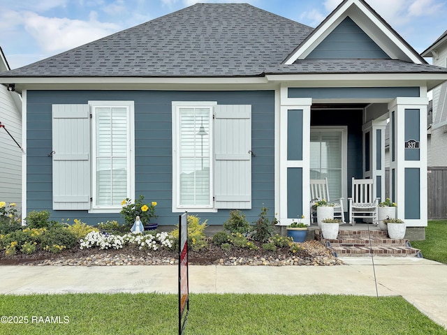 337 Bozeman Trl, Scott, LA 70583 - view of front of property featuring a shingled roof and a porch