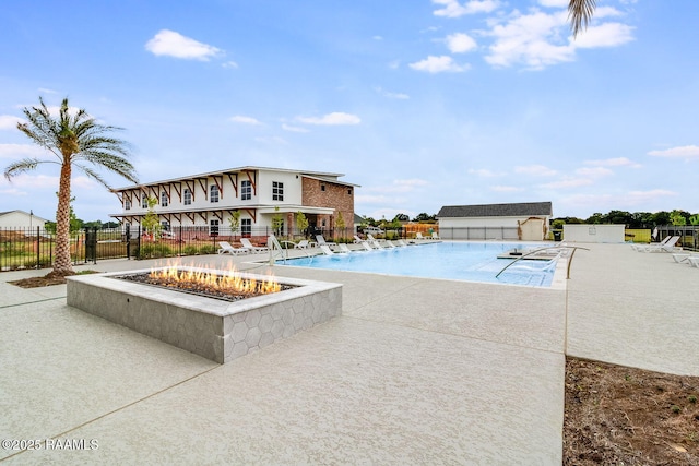 337 Bozeman Trl, Scott, LA 70583 - community pool featuring a patio