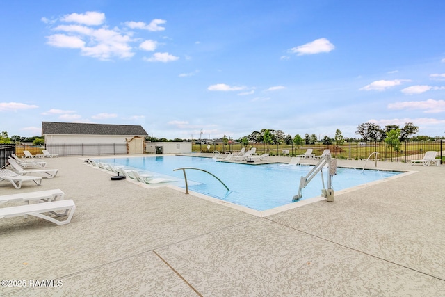 337 Bozeman Trl, Scott, LA 70583 - community pool featuring a patio area