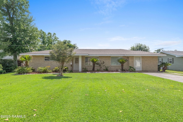 4119 Pleasant Dr, Lake Charles, LA 70605 - ranch-style home with a front lawn and brick siding