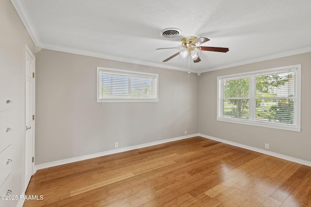 4119 Pleasant Dr, Lake Charles, LA 70605 - unfurnished room featuring plenty of natural light, a ceiling fan, light wood-type flooring, and ornamental molding