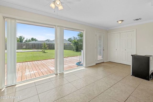 4119 Pleasant Dr, Lake Charles, LA 70605 - interior space with light tile patterned floors, crown molding, a ceiling fan, and baseboards