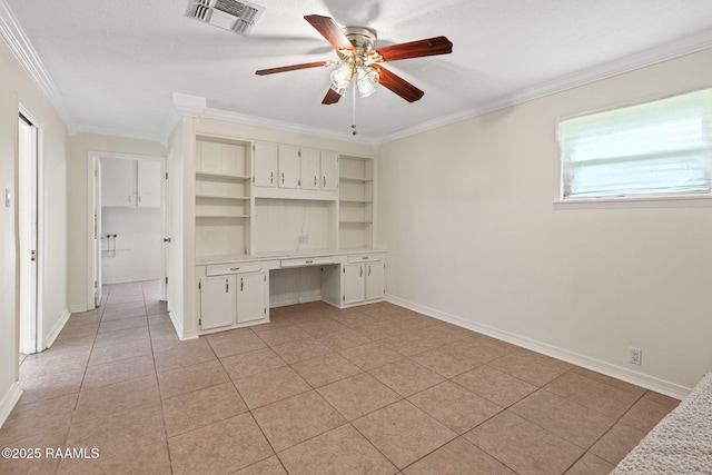 4119 Pleasant Dr, Lake Charles, LA 70605 - unfurnished office with built in desk, crown molding, ceiling fan, light tile patterned floors, and baseboards
