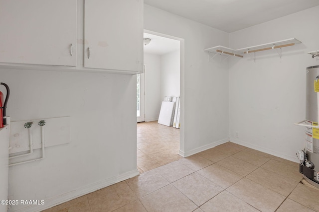 4119 Pleasant Dr, Lake Charles, LA 70605 - spacious closet with light tile patterned flooring and gas water heater