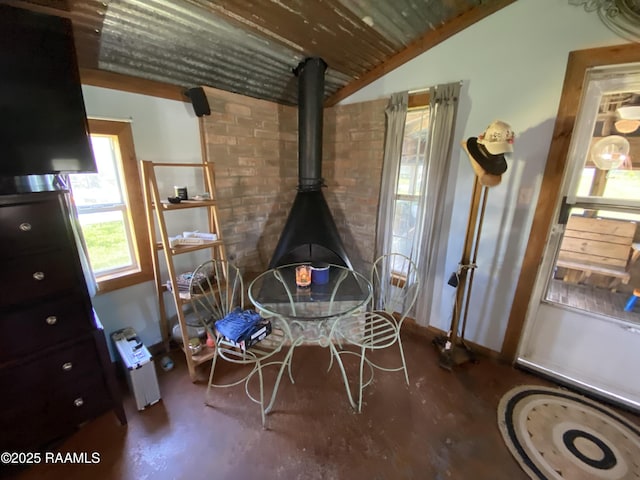 119 Opus Ln, Lafayette, LA 70506 - interior space featuring lofted ceiling, baseboards, wood ceiling, and a wood stove