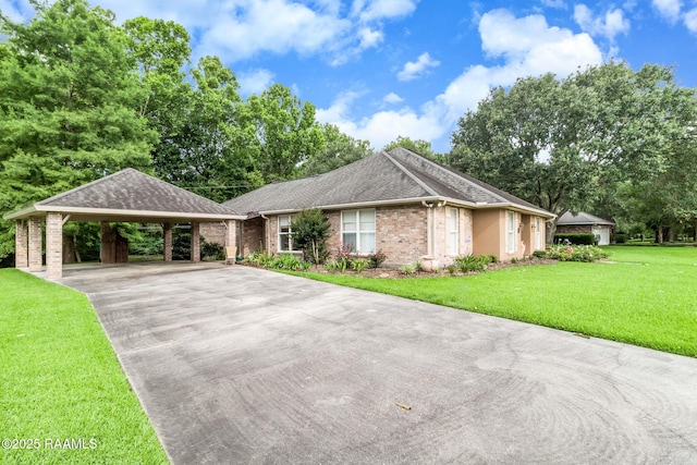 2424 Vista Dr, Opelousas, LA 70570 - ranch-style house featuring concrete driveway, a shingled roof, brick siding, a front yard, and view of scattered trees