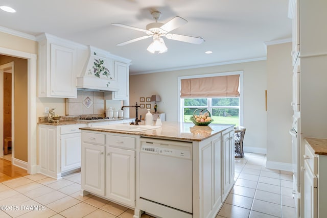 2424 Vista Dr, Opelousas, LA 70570 - kitchen with white appliances, crown molding, light tile patterned floors, white cabinets, and recessed lighting