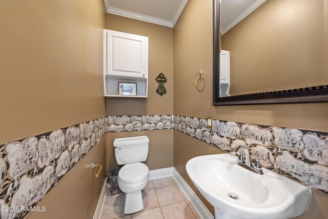 202 Kincaid Ct, Lafayette, LA 70508 - half bathroom with toilet, crown molding, baseboards, a sink, and tile patterned flooring