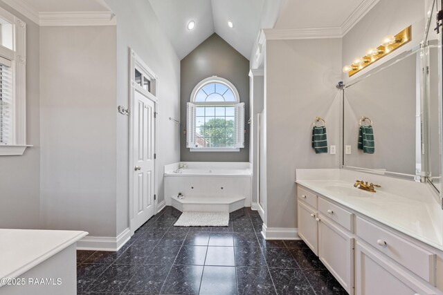 202 Kincaid Ct, Lafayette, LA 70508 - bathroom featuring vanity, a garden tub, baseboards, marble look tile flooring, and ornamental molding