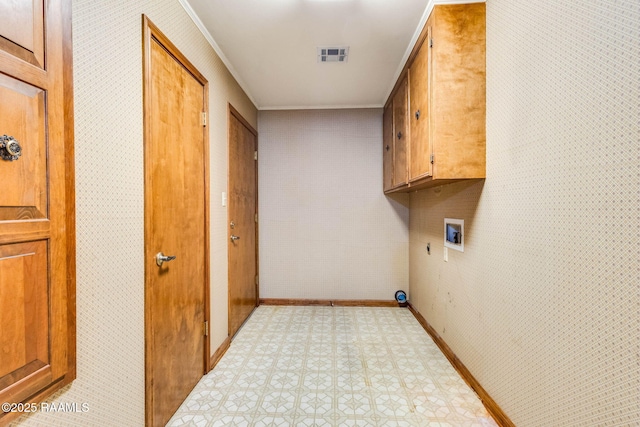 138 Cypress Dr, Opelousas, LA 70570 - laundry room featuring cabinet space, ornamental molding, hookup for a washing machine, tile patterned floors, and baseboards