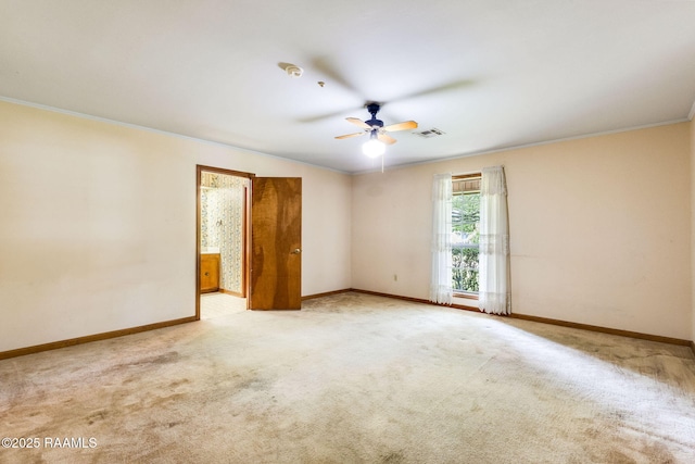 138 Cypress Dr, Opelousas, LA 70570 - spare room featuring a ceiling fan, baseboards, carpet floors, and crown molding