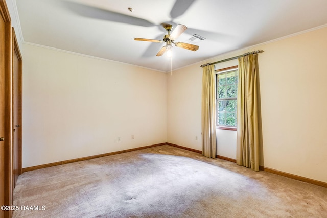 138 Cypress Dr, Opelousas, LA 70570 - spare room with ceiling fan, carpet floors, baseboards, and ornamental molding