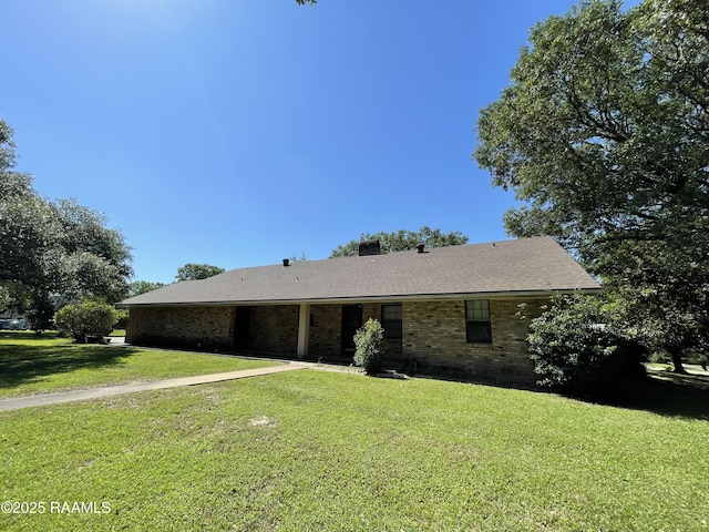 138 Cypress Dr, Opelousas, LA 70570 - ranch-style home featuring brick siding and a front lawn
