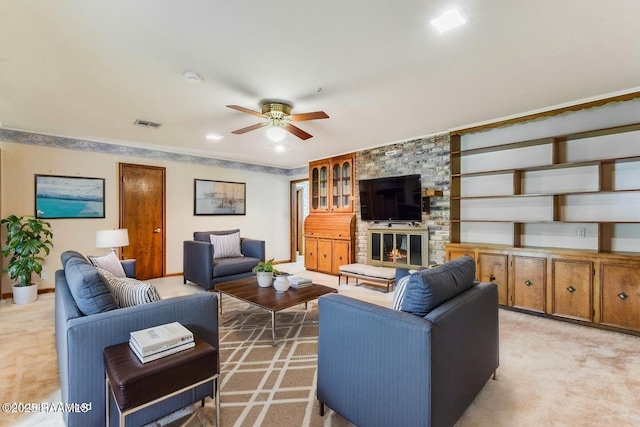 138 Cypress Dr, Opelousas, LA 70570 - living area with ceiling fan, light carpet, baseboards, and a large fireplace