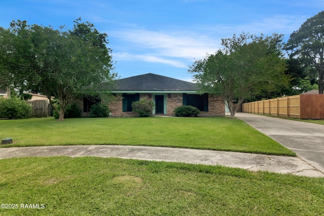 504 Presbytere Pkwy, Lafayette, LA 70503 - ranch-style house with driveway and brick siding