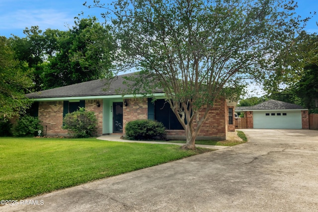 504 Presbytere Pkwy, Lafayette, LA 70503 - ranch-style home with brick siding, driveway, and an outbuilding