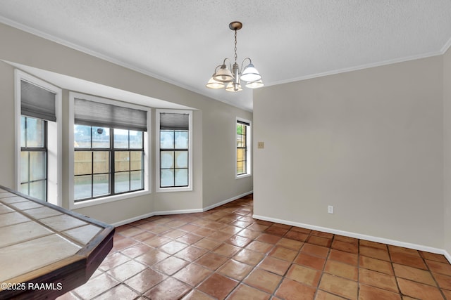 504 Presbytere Pkwy, Lafayette, LA 70503 - tiled spare room with ornamental molding, a textured ceiling, a chandelier, and baseboards