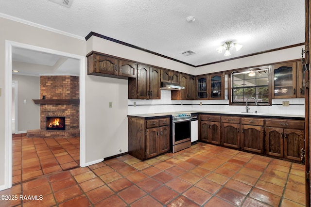 504 Presbytere Pkwy, Lafayette, LA 70503 - kitchen with stainless steel electric stove, crown molding, dark brown cabinetry, glass insert cabinets, and under cabinet range hood