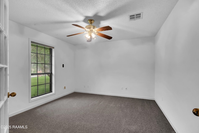 504 Presbytere Pkwy, Lafayette, LA 70503 - spare room featuring carpet, a ceiling fan, a textured ceiling, and baseboards
