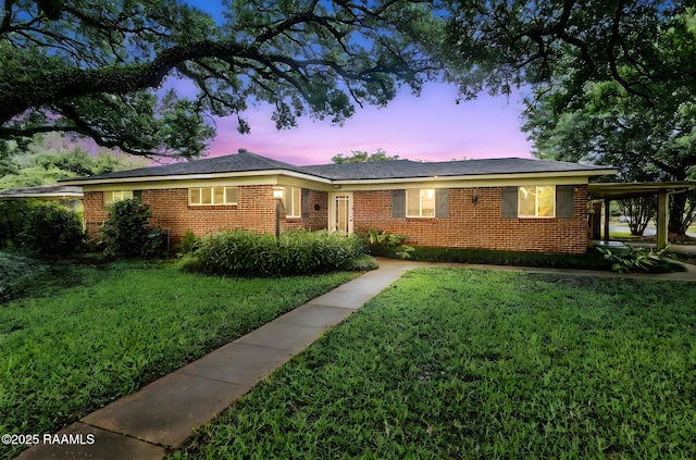 102 White Cir, Lafayette, LA 70506 - ranch-style home with a lawn and brick siding