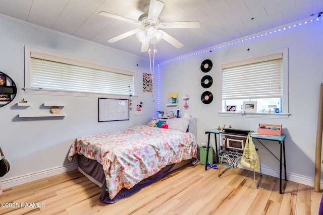 102 White Cir, Lafayette, LA 70506 - bedroom with wood finished floors, crown molding, and a ceiling fan