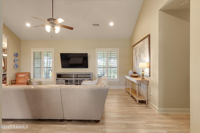 209 E Vincent St, Maurice, LA 70555 - living area featuring lofted ceiling, a ceiling fan, light wood-type flooring, baseboards, and recessed lighting