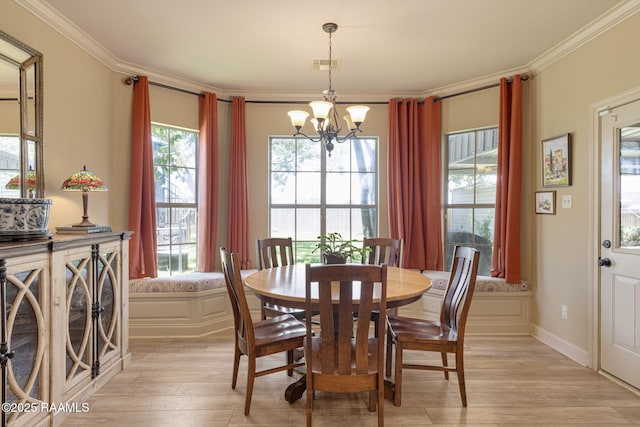 209 E Vincent St, Maurice, LA 70555 - dining area featuring a chandelier, crown molding, and light wood-style flooring