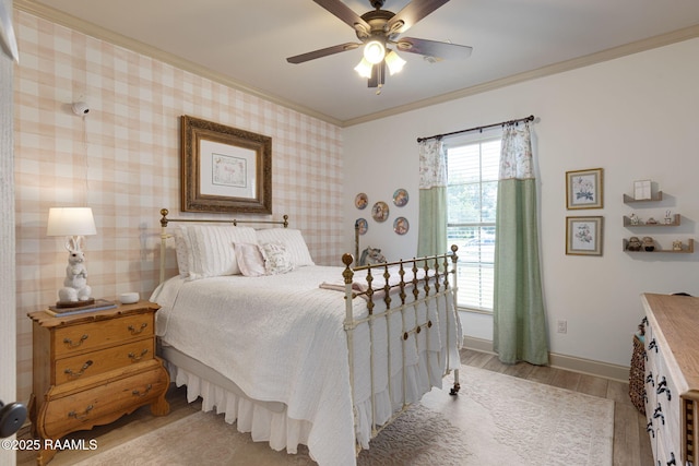 209 E Vincent St, Maurice, LA 70555 - bedroom featuring ornamental molding, light wood finished floors, baseboards, and a ceiling fan
