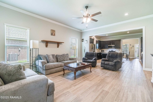 111 Rose Of Sharon Ln, Lafayette, LA 70508 - living area with ceiling fan, light wood-style floors, crown molding, baseboards, and recessed lighting