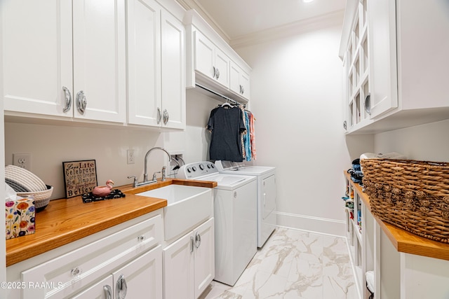 207 Bronze Palm Way, Youngsville, LA 70592 - washroom featuring washing machine and clothes dryer, cabinet space, light marble finish flooring, and crown molding