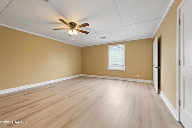 206 N Fernand St, Delcambre, LA 70528 - unfurnished bedroom with light wood-style flooring, ornamental molding, baseboards, and a ceiling fan