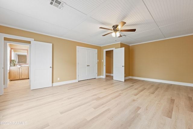 206 N Fernand St, Delcambre, LA 70528 - unfurnished bedroom with light wood-type flooring, baseboards, crown molding, and a ceiling fan